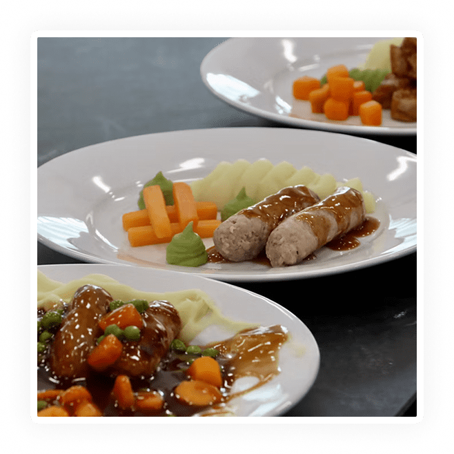 Three plated gourmet dishes with meat, vegetables, and artistic presentation.
